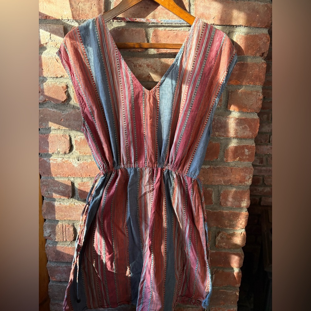 Universal thread dress, size XL. Good preloved condition.